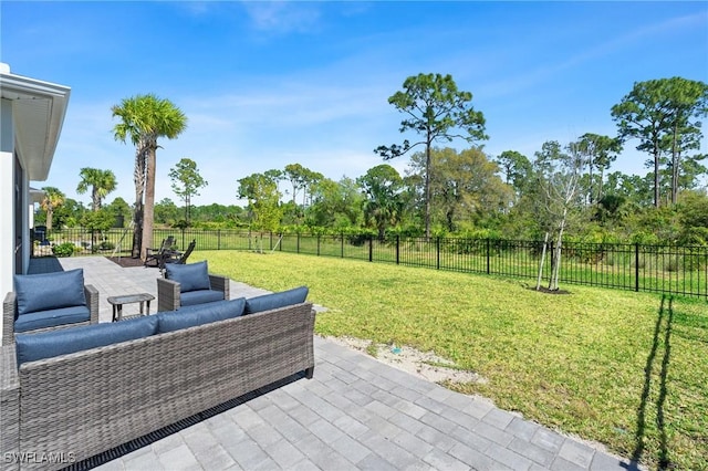 view of patio featuring a fenced backyard and an outdoor living space