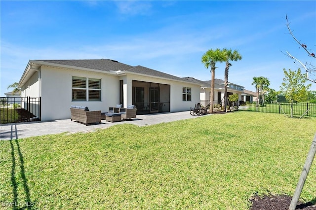 rear view of property featuring a patio area, a fenced backyard, an outdoor living space, and a yard