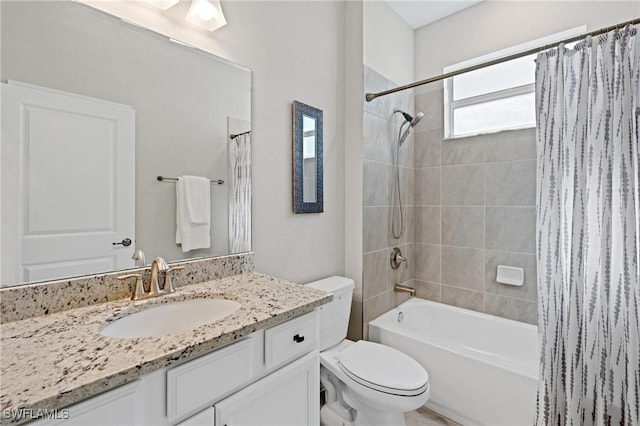 full bathroom featuring vanity, toilet, and shower / tub combo with curtain