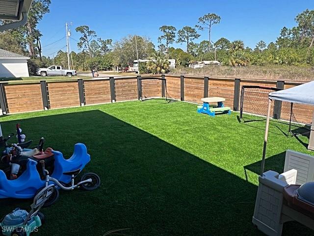 view of yard featuring fence