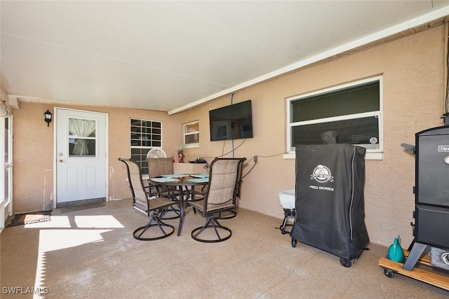 view of patio with outdoor dining space