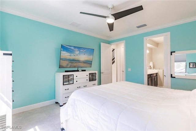 bedroom featuring crown molding, visible vents, a ceiling fan, ensuite bath, and baseboards