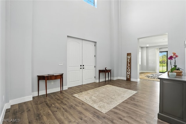 1474 Saint Clair Shores Rd, Naples, FL 34104 - entrance foyer with a towering ceiling and wood finished floors