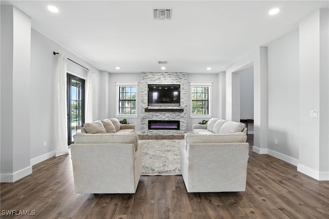 1474 Saint Clair Shores Rd, Naples, FL 34104 - living area featuring a large fireplace, dark wood finished floors, and recessed lighting