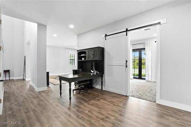 1474 Saint Clair Shores Rd, Naples, FL 34104 - office area featuring a barn door, wood finished floors, and recessed lighting