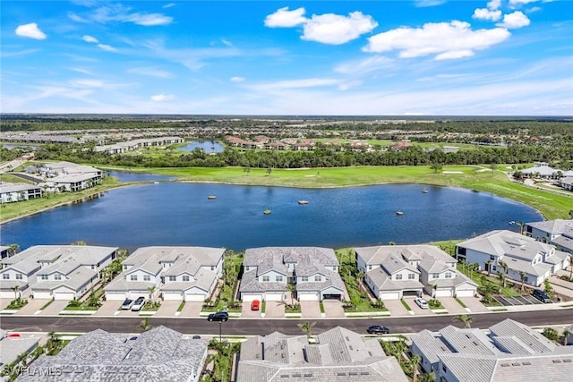 bird's eye view with a water view and a residential view