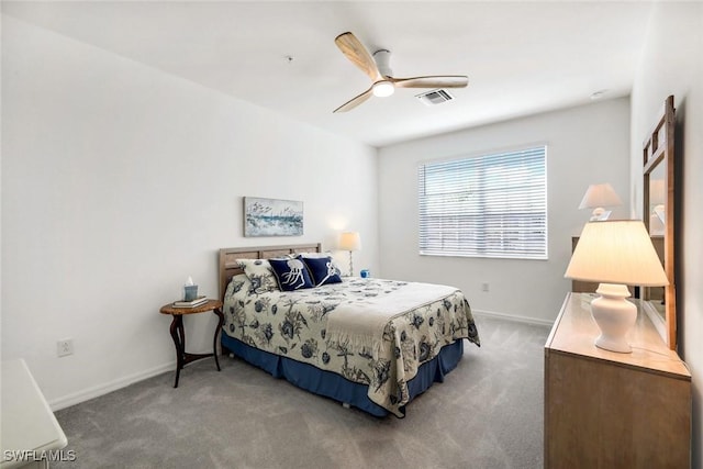 bedroom with a ceiling fan, carpet, visible vents, and baseboards