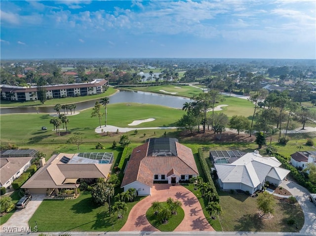 aerial view with a water view and golf course view