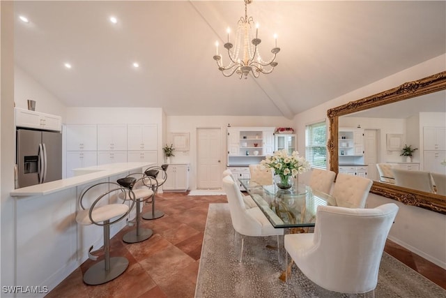 dining space with recessed lighting, baseboards, a notable chandelier, and high vaulted ceiling