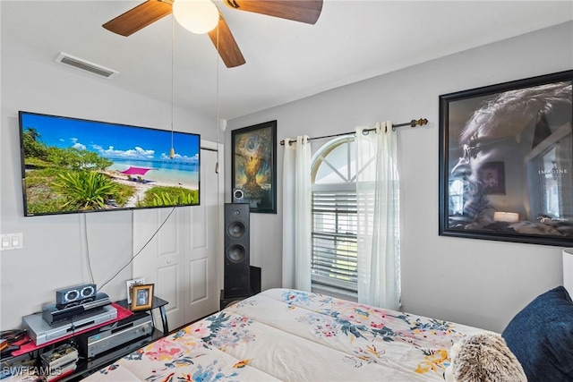 bedroom featuring visible vents and ceiling fan