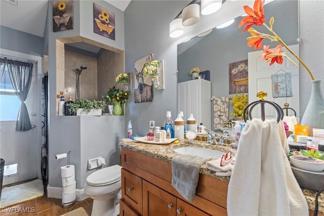 full bath featuring visible vents, toilet, a tile shower, tile patterned floors, and vanity