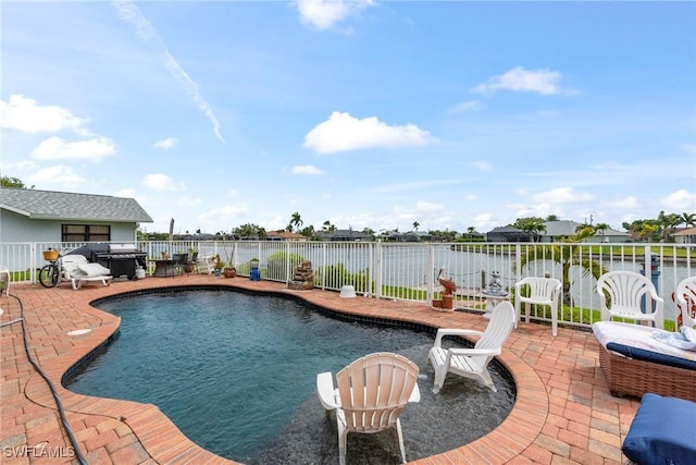 view of pool featuring a patio area, a fenced in pool, and fence