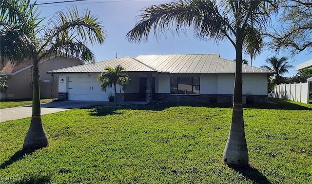 single story home featuring stucco siding, concrete driveway, metal roof, fence, and stone siding