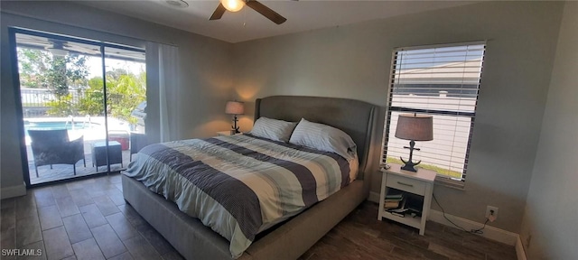 bedroom with access to outside, wood finished floors, a ceiling fan, and baseboards