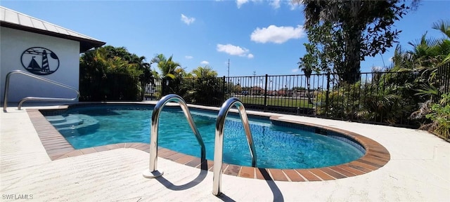 view of pool with a patio, fence, and a fenced in pool