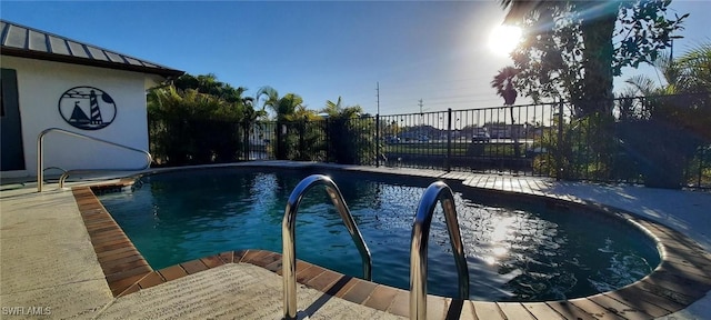 view of pool featuring fence and a fenced in pool