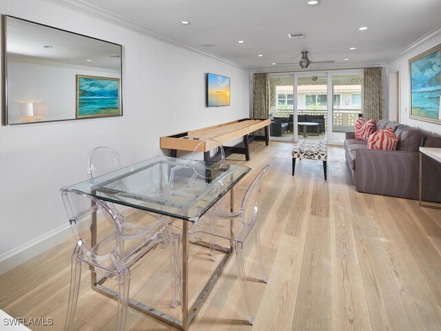 playroom with baseboards, light wood-style flooring, ceiling fan, crown molding, and recessed lighting