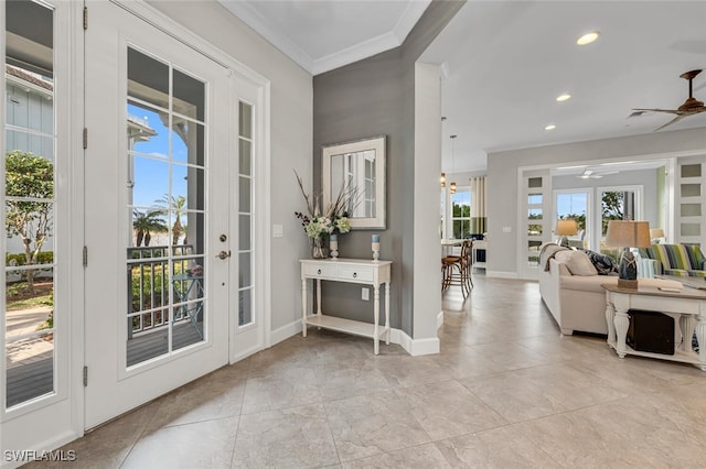 entryway with ceiling fan, light tile patterned floors, recessed lighting, baseboards, and crown molding