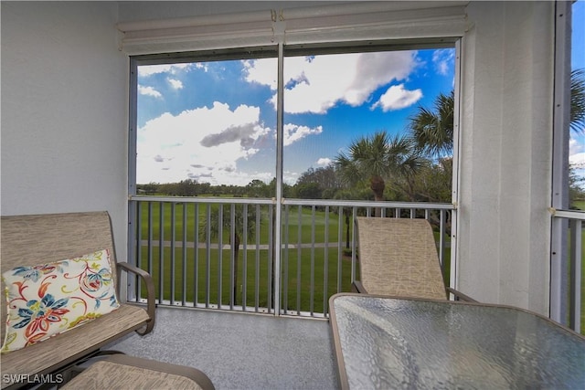 sunroom featuring a healthy amount of sunlight