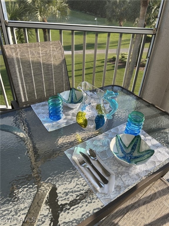 balcony featuring outdoor dining area