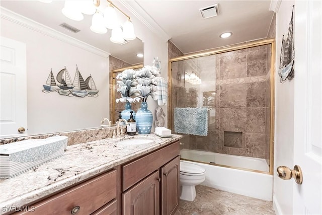 bathroom featuring toilet, visible vents, crown molding, and vanity