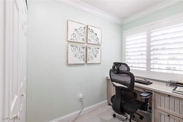 office space with ornamental molding and baseboards