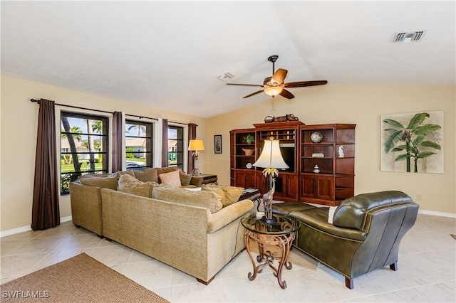 living room featuring visible vents, vaulted ceiling, baseboards, and light tile patterned flooring