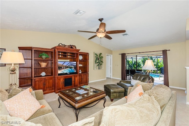 living room with a ceiling fan, lofted ceiling, visible vents, and baseboards