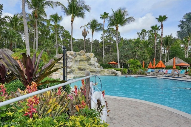 community pool featuring a patio area