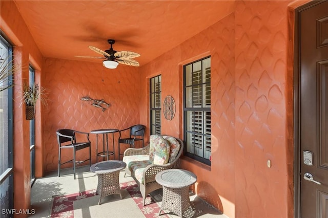 view of patio featuring ceiling fan