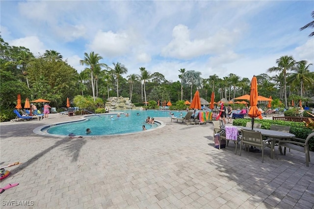 pool featuring a patio area