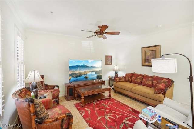 living area with ornamental molding and ceiling fan