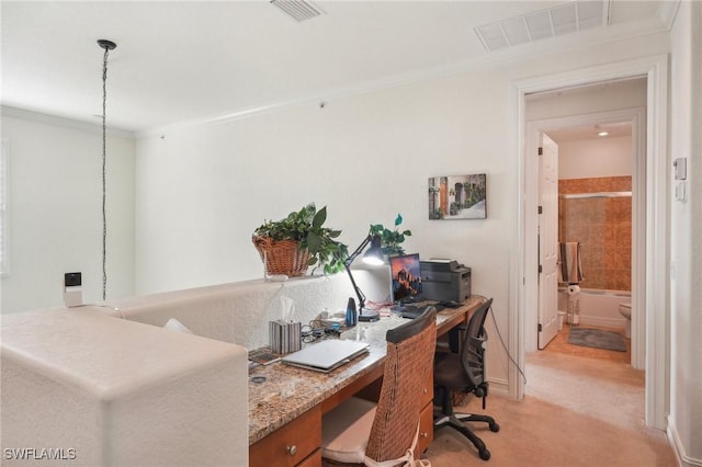 office area with visible vents, crown molding, and light colored carpet