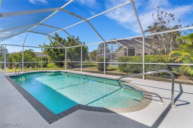 3650 Sunland Ln, Estero, FL 33928 - swimming pool featuring a patio area and glass enclosure