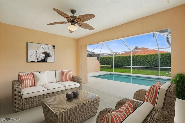 interior space with a sunroom and a ceiling fan