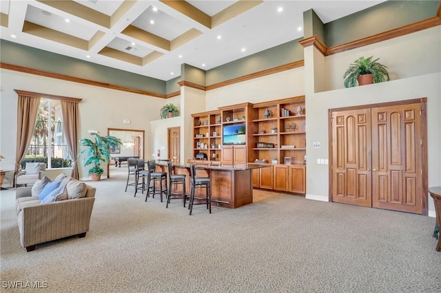 kitchen with coffered ceiling, light colored carpet, a breakfast bar area, open floor plan, and open shelves