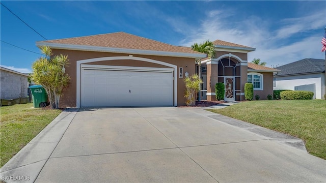 view of front facade with concrete driveway, a front lawn, an attached garage, and stucco siding