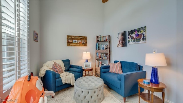 sitting room featuring baseboards