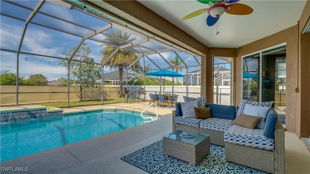 view of swimming pool featuring a fenced in pool, a patio, glass enclosure, an outdoor hangout area, and fence