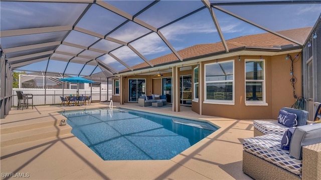 view of pool featuring ceiling fan, an outdoor hangout area, a fenced in pool, and a patio