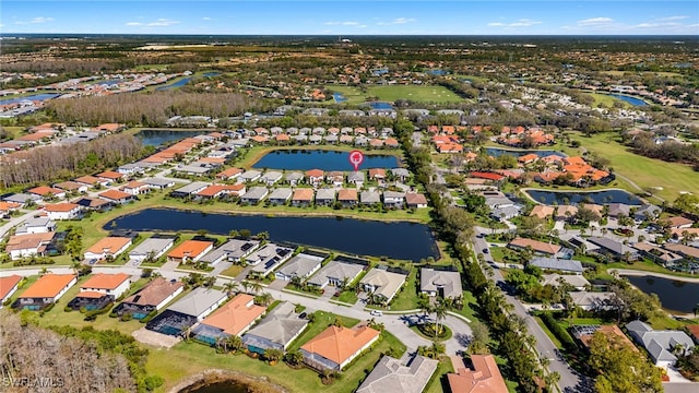 aerial view featuring a residential view and a water view