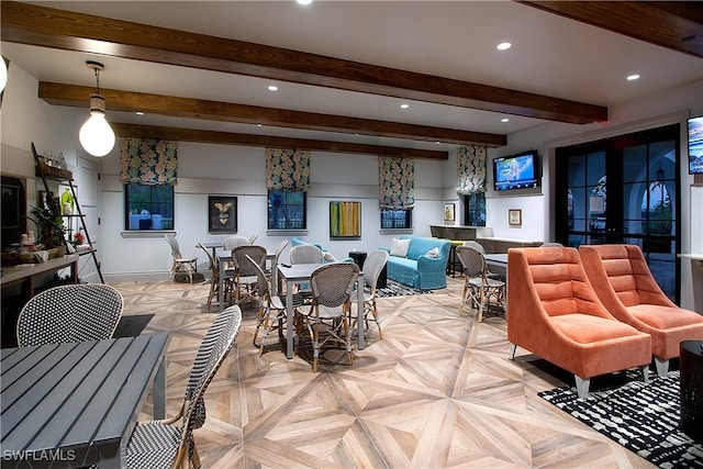 dining room featuring baseboards, beam ceiling, and recessed lighting