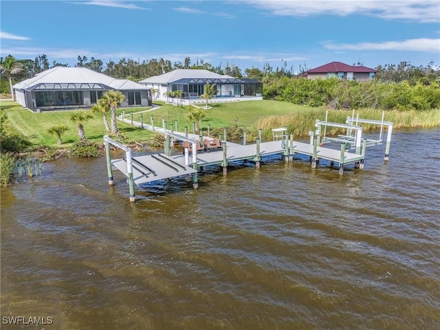 view of dock with a water view, boat lift, a lanai, and a lawn