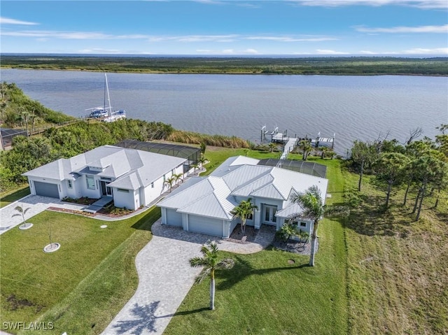 drone / aerial view featuring a water view