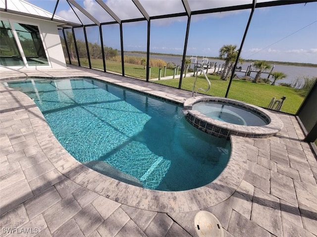 view of swimming pool with a pool with connected hot tub, glass enclosure, a yard, and a patio