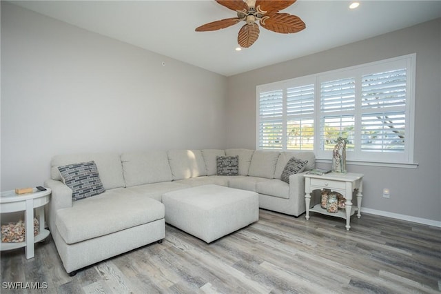 living room with ceiling fan, baseboards, wood finished floors, and recessed lighting