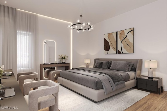 bedroom with a notable chandelier and light wood-style floors