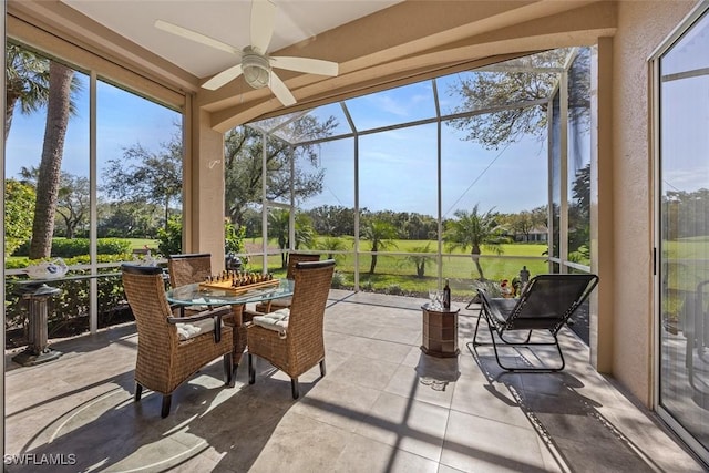 sunroom / solarium with ceiling fan