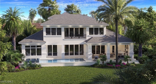 713 Nautilus Ct, Marco Island, FL 34145 - rear view of property featuring a balcony, a lawn, stucco siding, and an outdoor pool