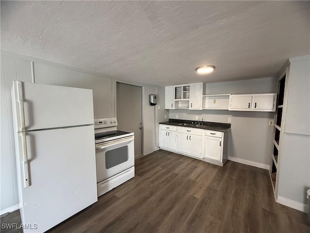 kitchen with open shelves, white appliances, dark wood-style flooring, a textured ceiling, and dark countertops